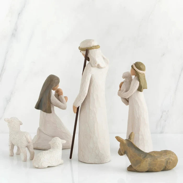 Nativity scene with figures on a white background