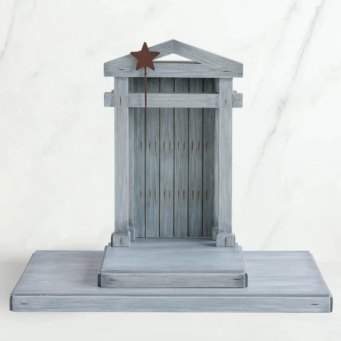 Decorative Creche with a star on a white background
