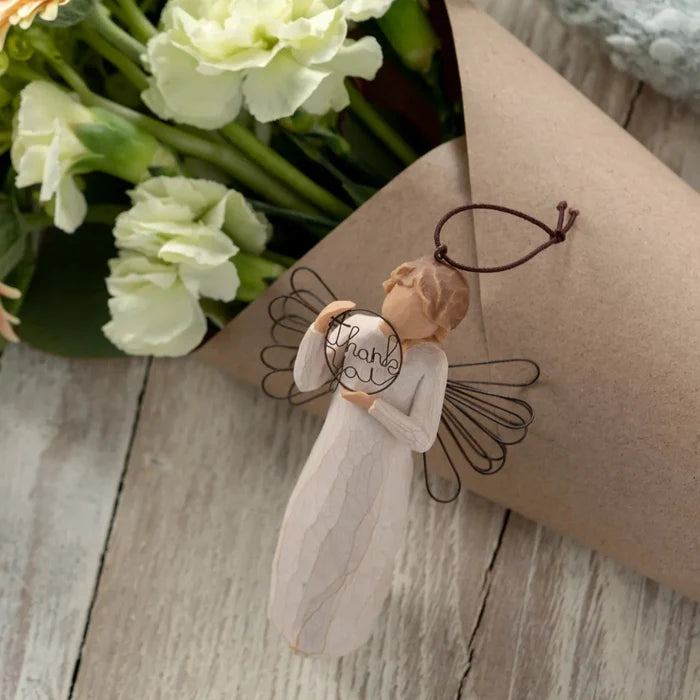 Willow Tree Thank you ornament on a wooden table  background