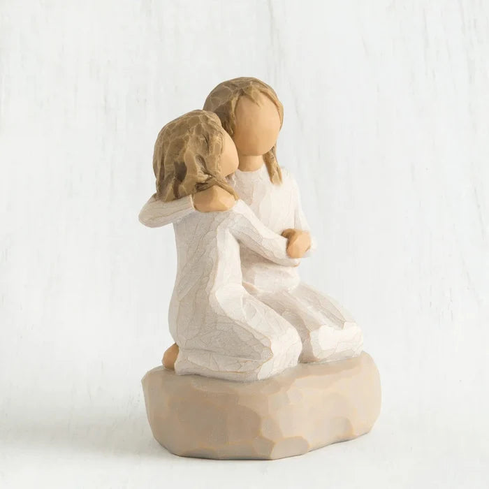 Willow Tree Sister Mine figurine showing two sisters sitting together  side view  in a white background