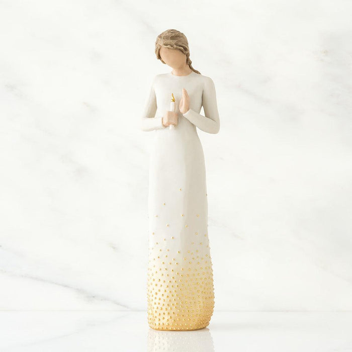 Decorative vase with a gradient design from white to gold on a white background