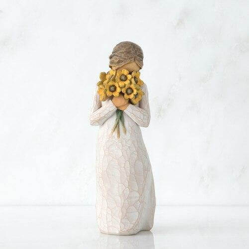 "Willow Tree Warm Embrace Figurine – girl holding yellow sunflower bouquet, hand-painted resin sculpture by Susan Lordi symbolizing warmth and gratitude\""